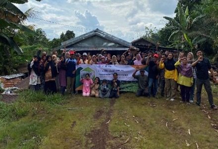 Group photo at a village engagement event